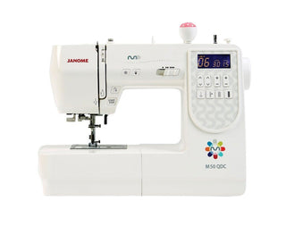 Janome M50 QDC Sewing Machine - includes extension table, hard cover and bonus package
