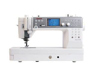 Janome Memory Craft 6700P Professional Long Arm Flat Bed Sewing Machine - professional grade features, metal body, 10 inch work space, 9mm stitch width, extension table, knee lift